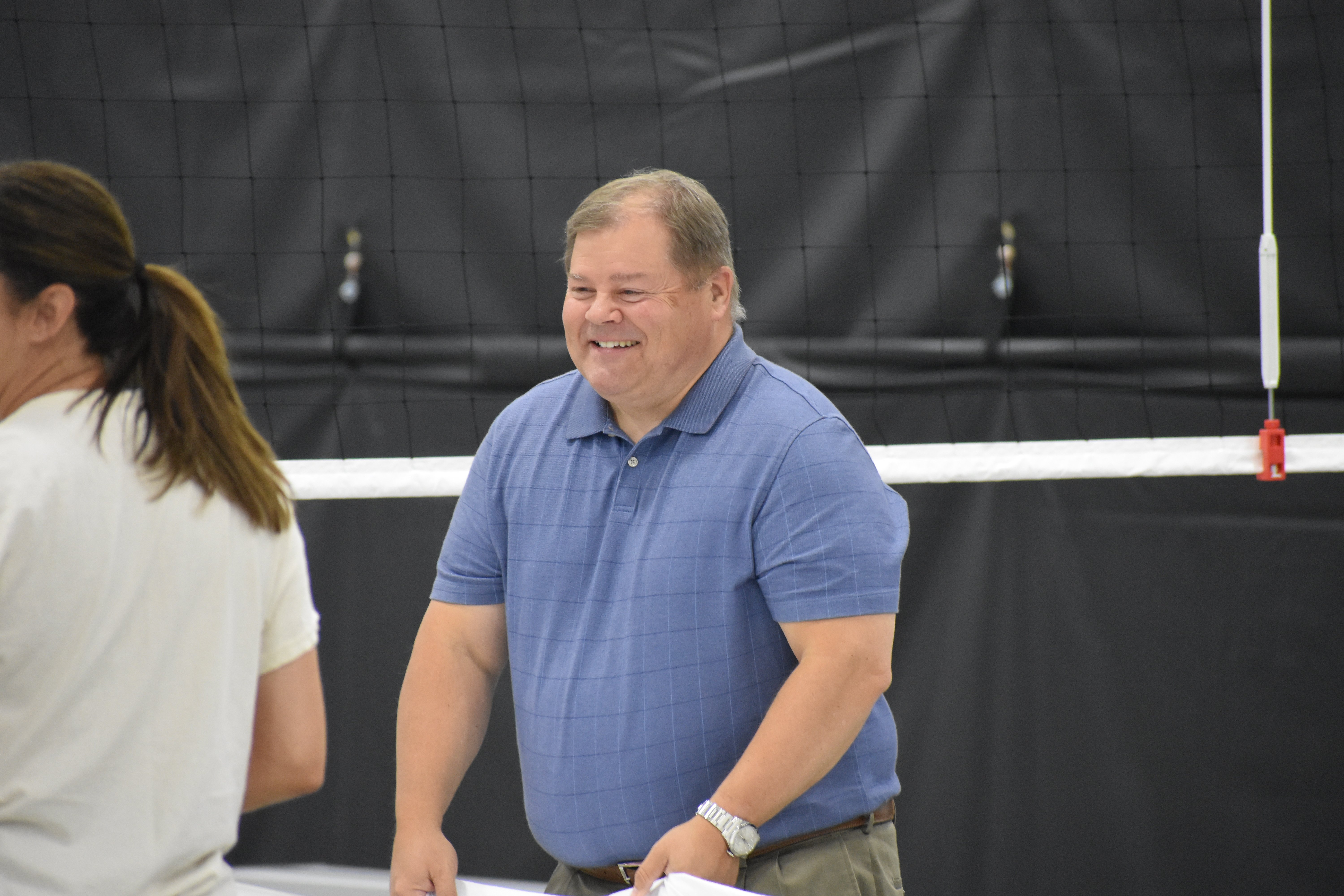 Larry King smiles while playing Sheet Volleyball | Talent Development Hosts Building Leaders Alumni Event in Cincinnati