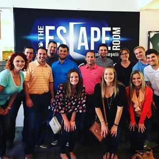 team photo at the escape room in Carmel, Indiana | Annmarie's Story: From Intern to Director